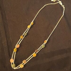 Sterling silver necklace with multicolored stones.